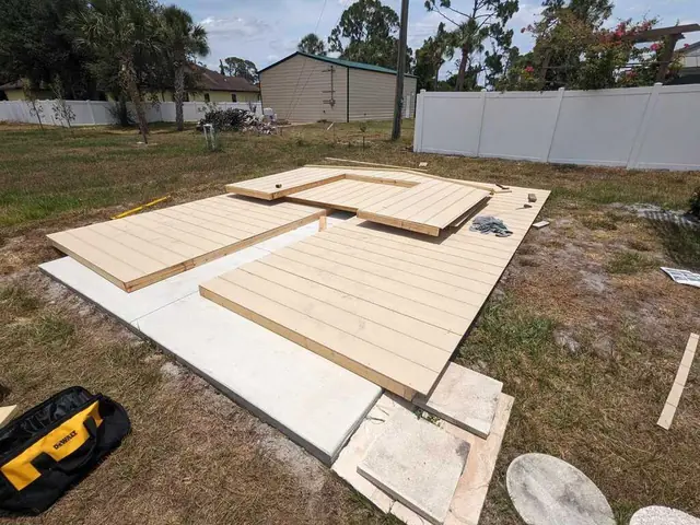 Custom deck build by Fix it Once Handyman Services — Pressure-treated deck framed on slab — North Port